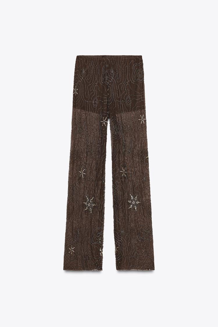 Pantalon transparent à sequins contrastés