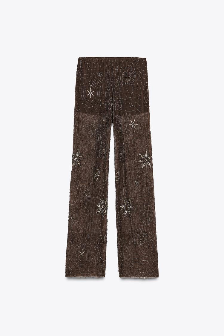 Pantalon transparent à sequins contrastés