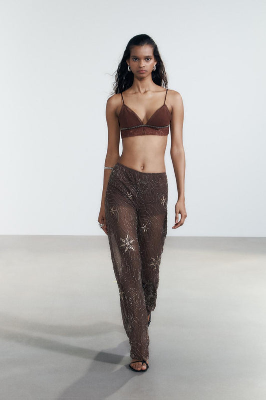 Pantalon transparent à sequins contrastés