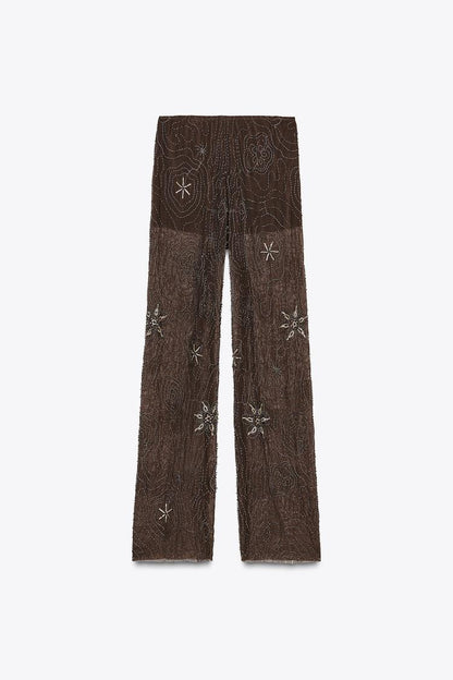 Pantalon transparent à sequins contrastés